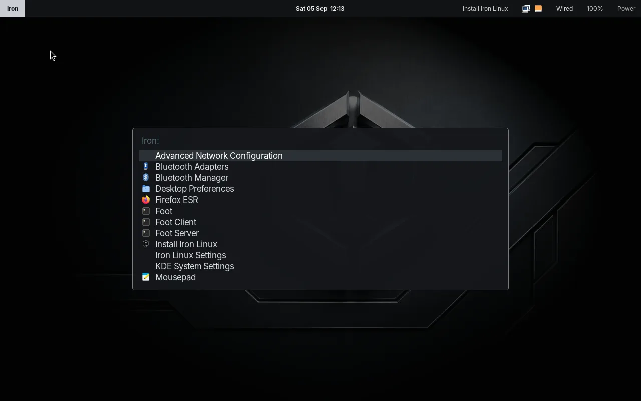 Iron Linux desktop with the Iron panel and application launcher